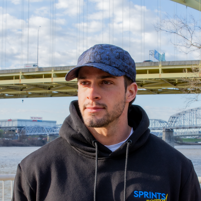 Person wearing the Acid Jag Blue OG hat