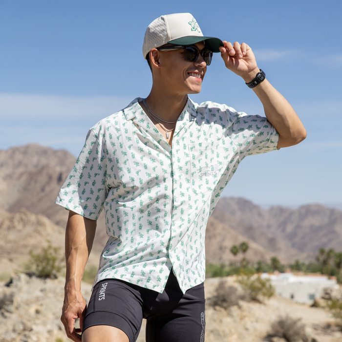 Person wearing the Avigate Oxford Shirt in Slow Days Turtles print