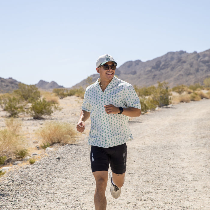 Person wearing the Avigate Oxford Shirt in Slow Days Turtles print, side view