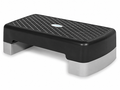 The Bedside Step Stool is a black and gray aerobic step platform featuring a textured, non-slip surface, perfect for fitness and exercise routines—and its versatile design allows it to double as a sturdy bedside step stool, offering enhanced safety and convenience.