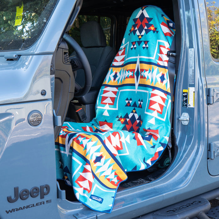 Bohemian Nomad Noises Car Seat Cover Towel installed on a car seat headrest