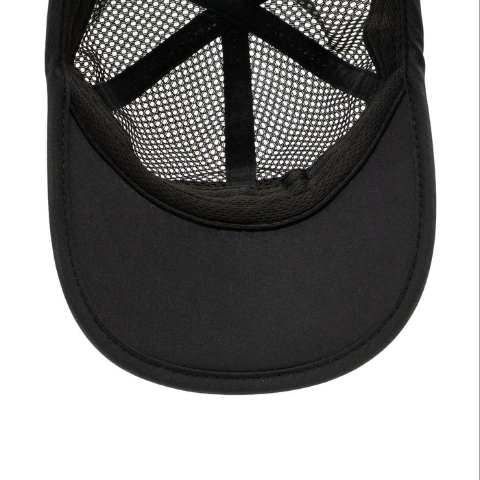 Runner wearing the Burnt Out M6SH Hat