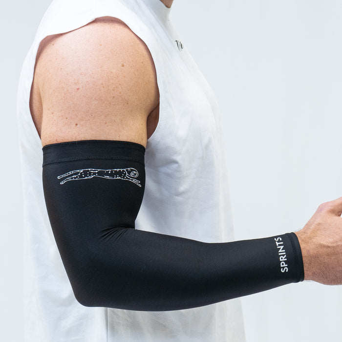 Person wearing the Compression Arm Sleeves in Black Flash Reflective, close-up