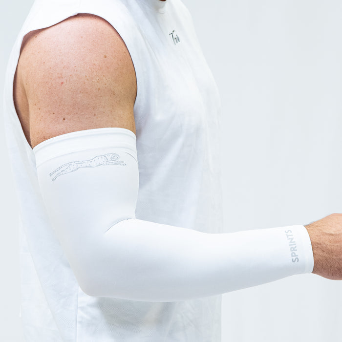 Person wearing the Compression Arm Sleeves in Supercell Flash Reflective, close-up