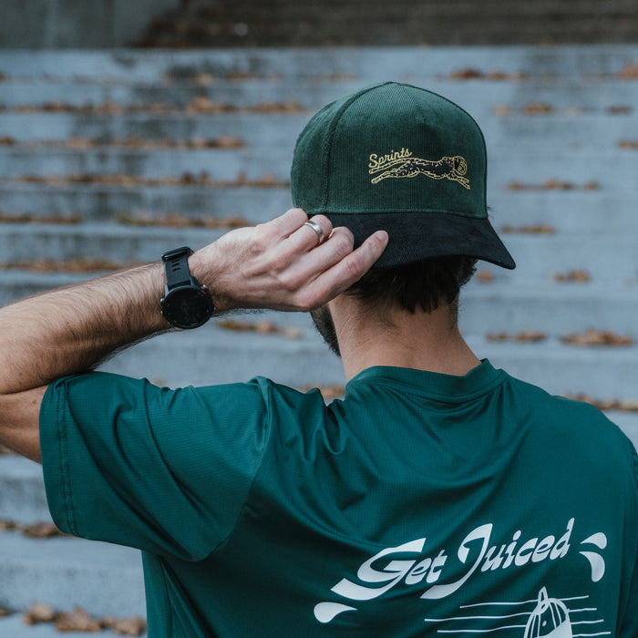 Runner wearing the Corduroy Green Label Structured VP Hat