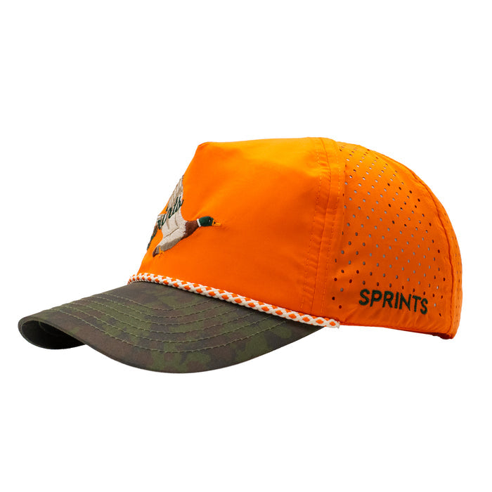 Runner wearing the Drake Visibility Orange EZ Rope Snapback Hat