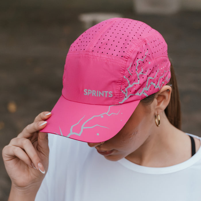 Person wearing the Dystopian Neon Pink Flash Reflective HyperG hat