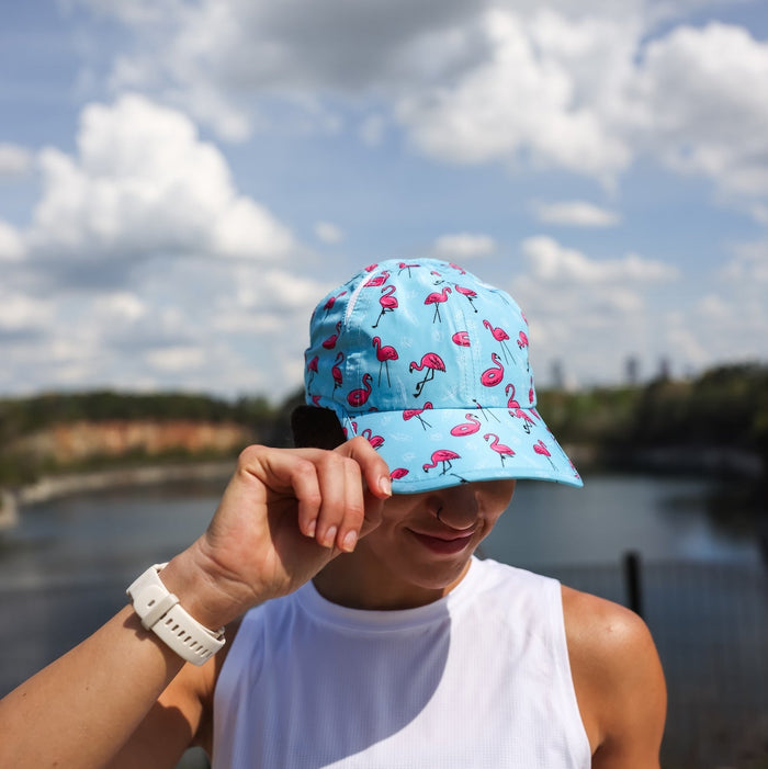 Woman wearing the Find the Fauxmingo OG hat - front view