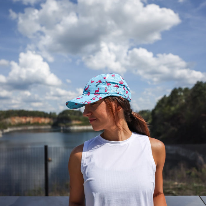 Woman wearing the Find the Fauxmingo OG hat - side view
