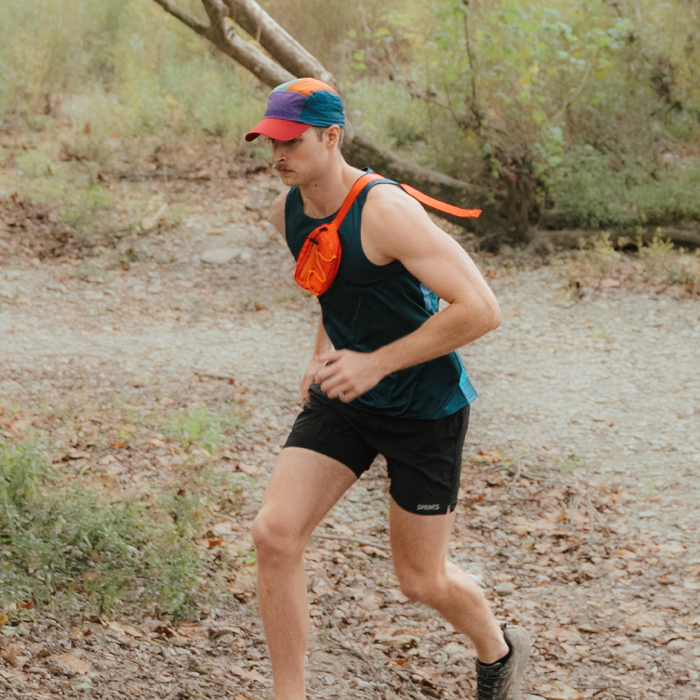 Runner wearing the Fire Ruck Sling It Bag