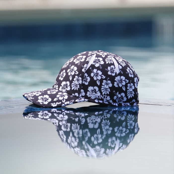 Person wearing the Flex on the Beach OG hat poolside