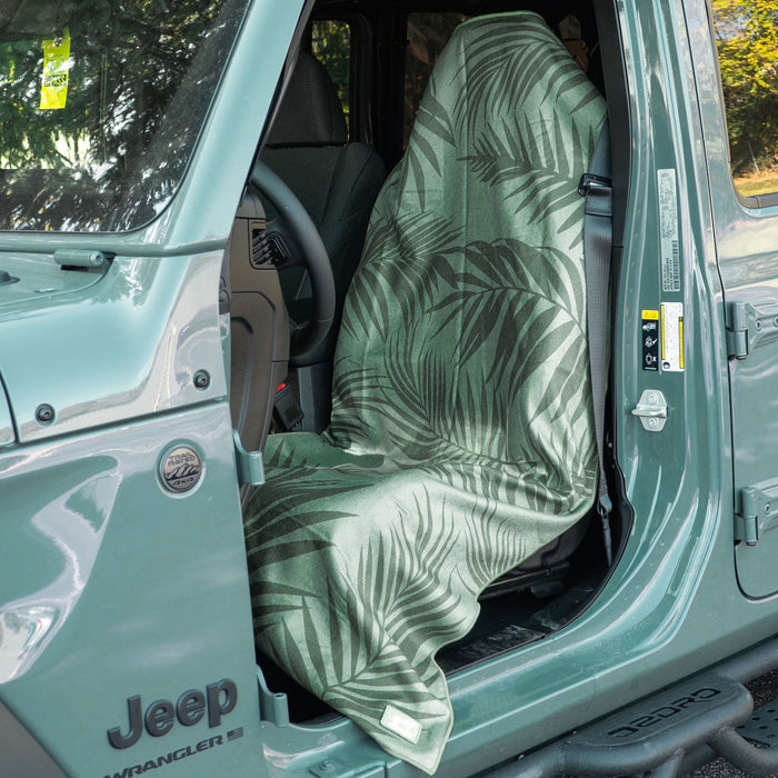 Garden of Races Past Car Seat Cover Towel installed on a car seat headrest