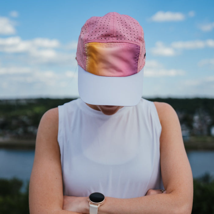 Runner wearing the Golden Hour HyperG Hat