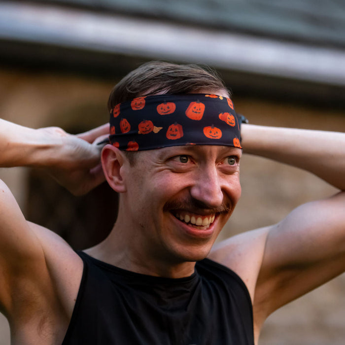 Person wearing the Grumpkin Pumpkin Headband