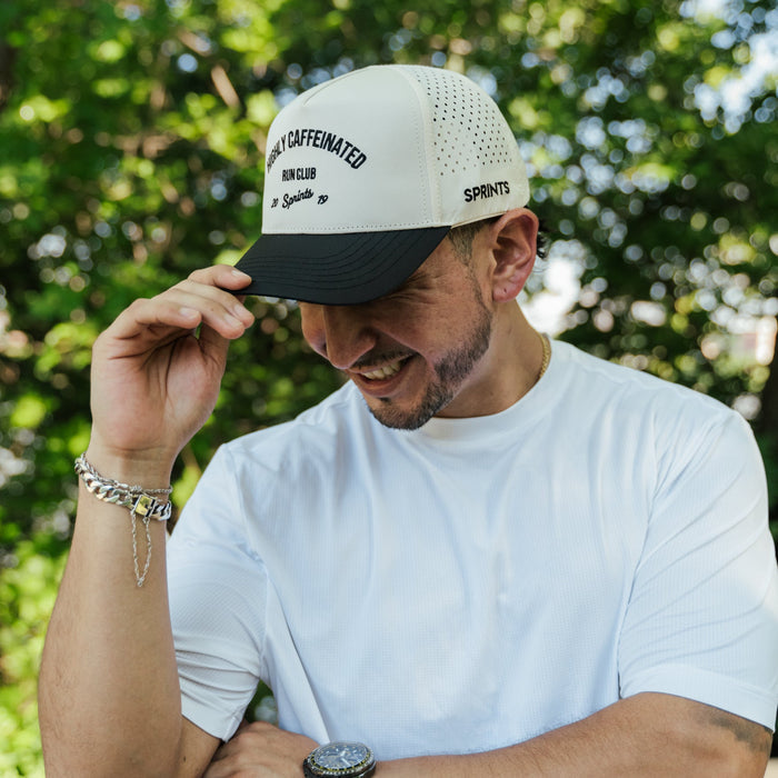 Runner wearing the Highly Caffeinated Run Club Structured VP Hat