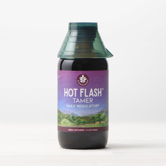 A bottle of Hot Flash Tamer, Daily Regulator herbal supplement for menopause support features a purple label with a landscape illustration, set against a plain white background.