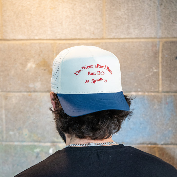 Runner wearing the I'm Nicer After I Run Club VP Hat