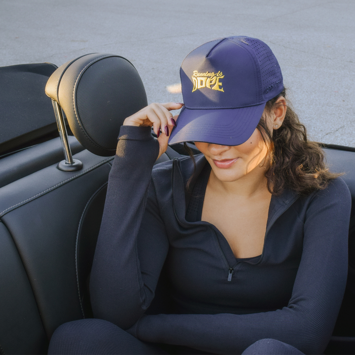 Person wearing the Late Show Glow Running is Dope VP hat