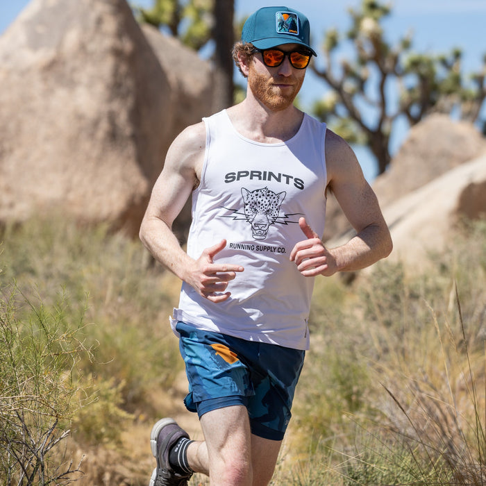 Man wearing the Avigate 5 inch Fusion Short in Sasquatch print, close-up