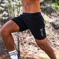 Man wearing the Avigate 5 inch Fusion Short in Stealth Black