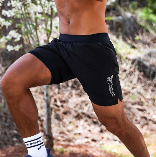 Man wearing the Avigate 5 inch Fusion Short in Stealth Black