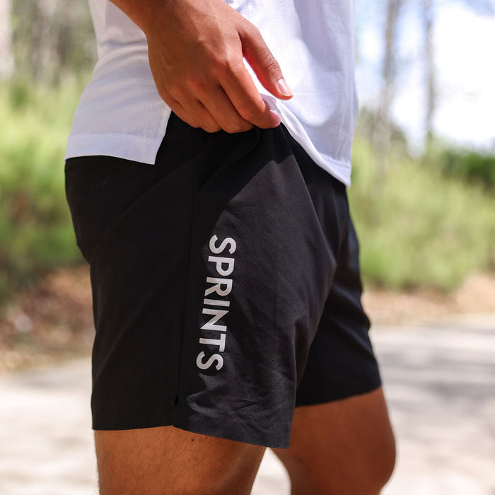 Man wearing the Avigate 5 inch Fusion Short in Stealth Black, side view