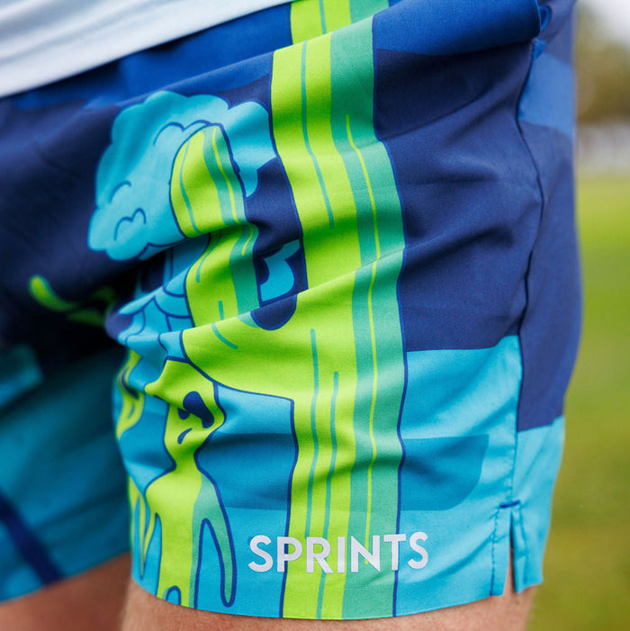 Man wearing the Avigate 5 inch Fusion Short in Uninvited Alien Antics print, close-up