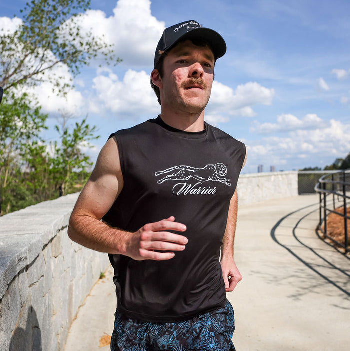 Man wearing the Core Zero Framework Tank in White Label, side view