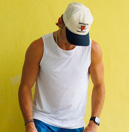 Man wearing the Core Zero Running Tank in Stealth White