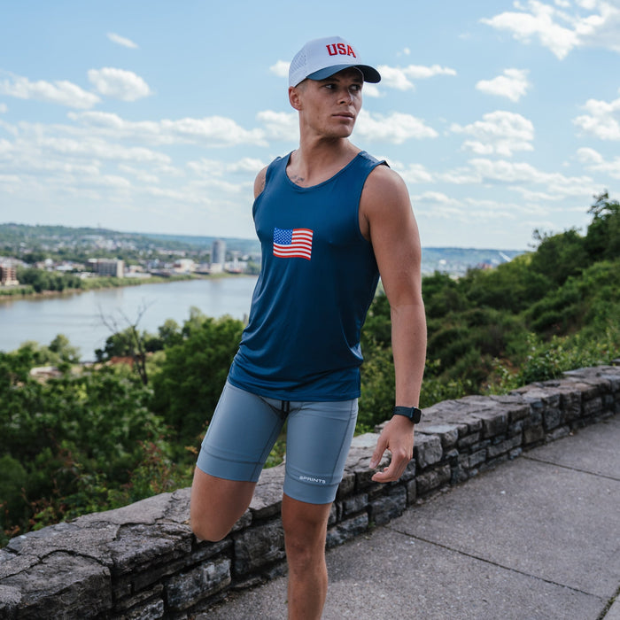 Man wearing the Mens Core Zero Running Tank, USA Navy, close-up