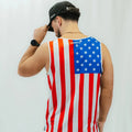 Man wearing the Core Zero Running Tank in USA White
