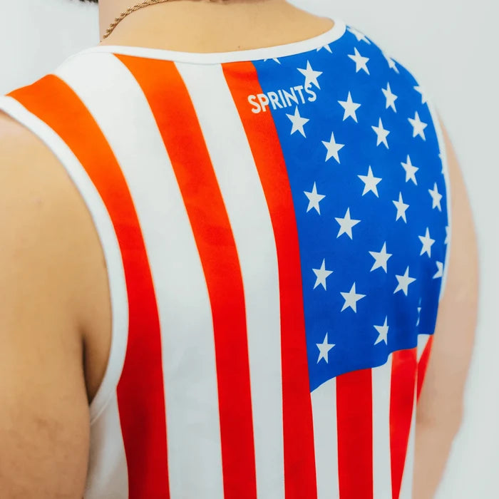 Man wearing the Core Zero Running Tank in USA White, close-up