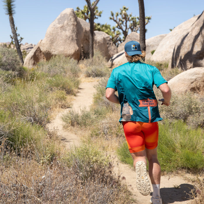 Man wearing the Core Zero Tech Tee in Sasquatch print, close-up