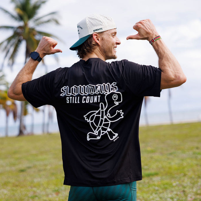Man wearing the Core Zero Tech Tee in Slow Days Black