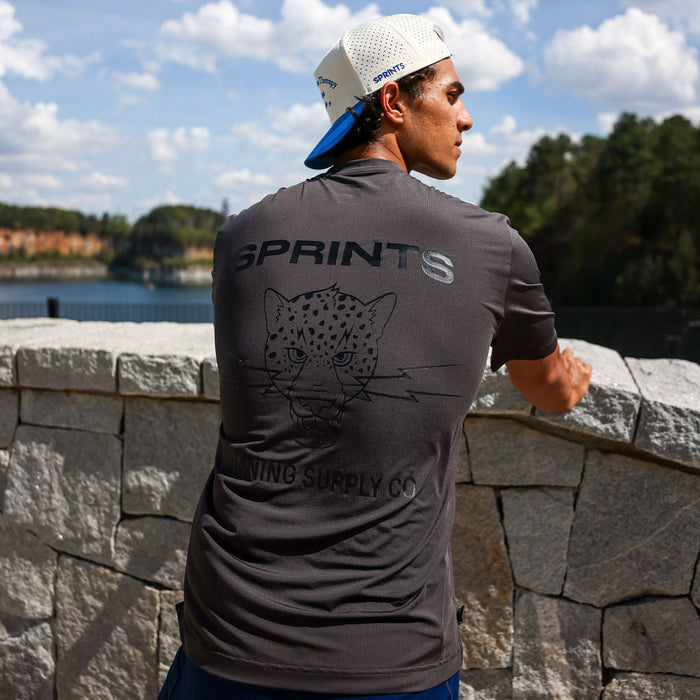 Man wearing the Core Zero Tech Tee in Vault Jag Charcoal