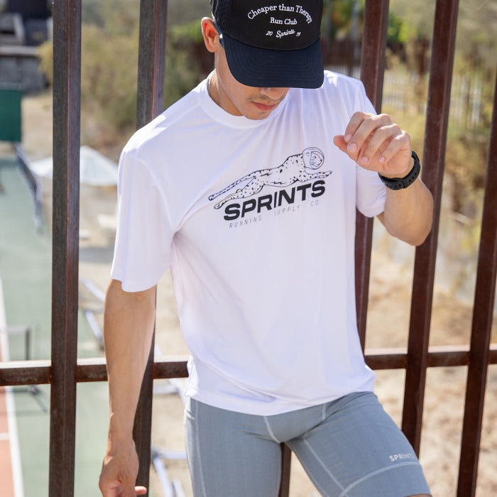 Man wearing the Core Zero Tech Tee in Velocity Sprints White