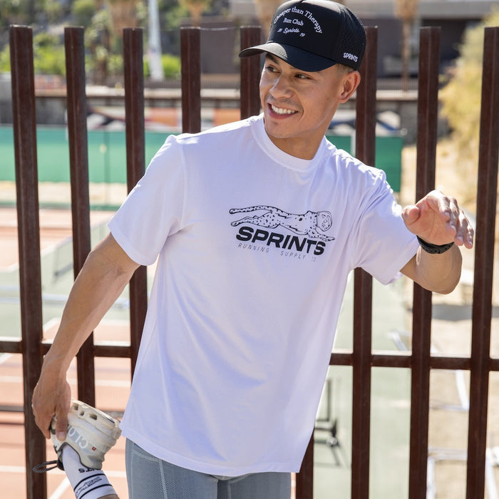 Man wearing the Core Zero Tech Tee in Velocity Sprints White, close-up