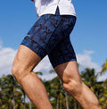 Man wearing the Flexion 8 inch Half Tights in Acid Jags print