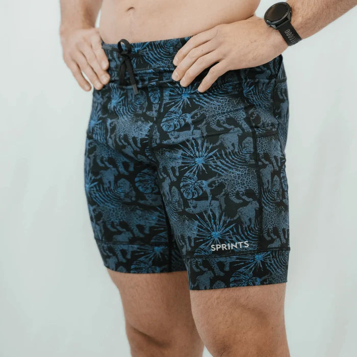 Man wearing the Flexion 8 inch Half Tights in Acid Jags print, close-up