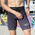 Man wearing the Flexion 8 inch Half Tights in Gridlock Grandstand Midnight