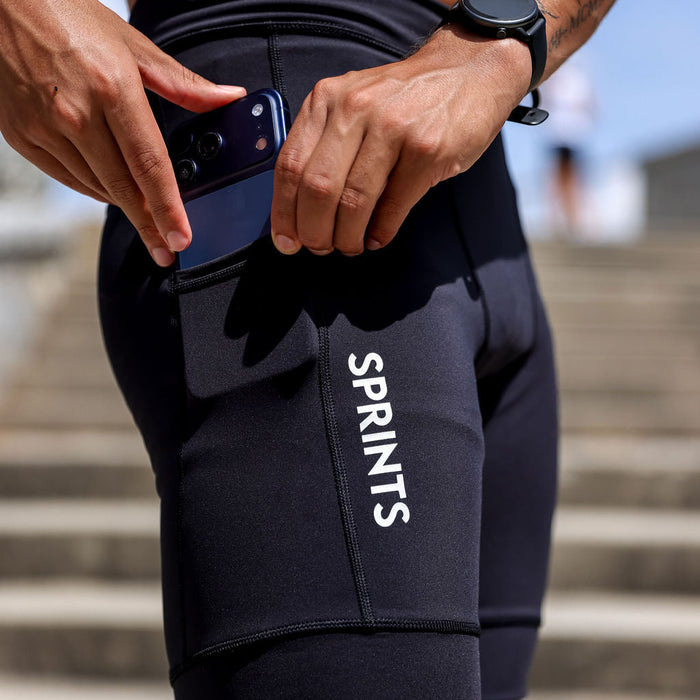 Man wearing the Flexion 8 inch Half Tights in Stealth Black, close-up
