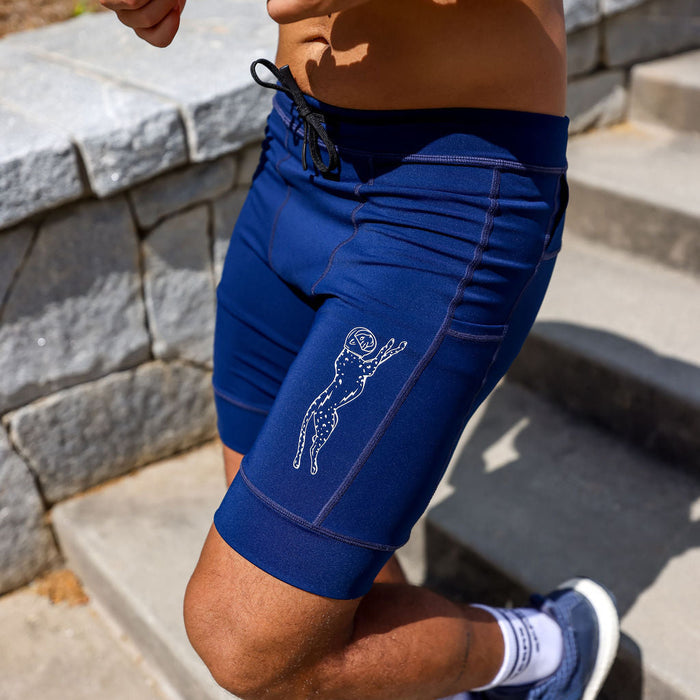 Man wearing the Flexion 8 inch Half Tights in Stealth Navy