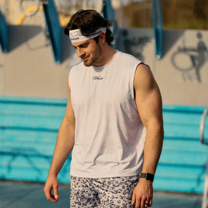 Man wearing the Mens Framework Tank in Warrior Jag