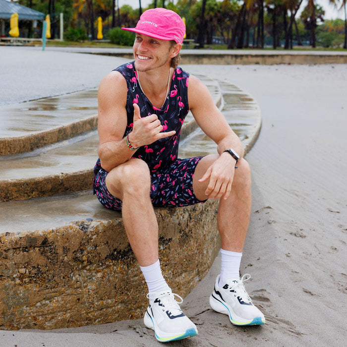 Man wearing the Find the Fauxmingo Running Tank in Black, close-up