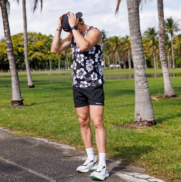 Man wearing the Flex on the Beach Running Tank while running