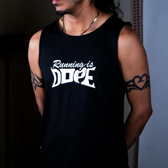Man wearing the Running is Dope Reflective Running Tank