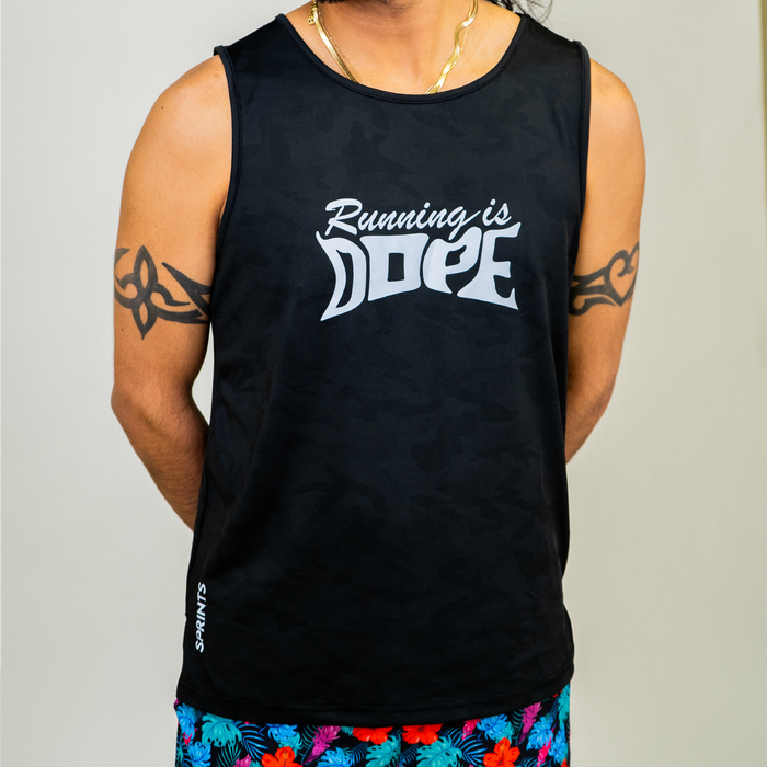 Man wearing the Running is Dope Reflective Running Tank while running