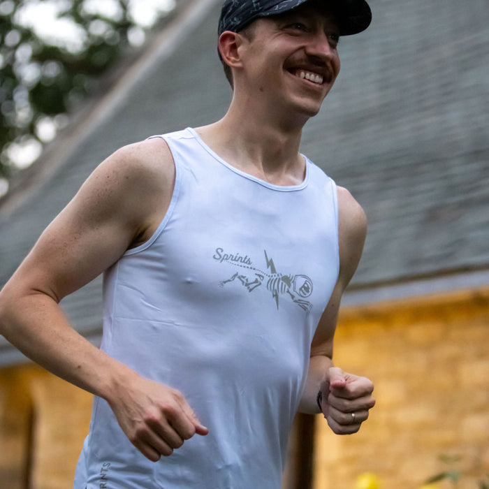 Man wearing the Shock Beast Miles Flash Reflective Running Tank, close-up