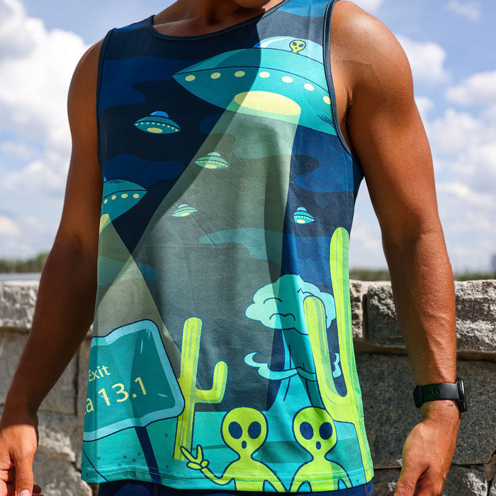 Man wearing the Uninvited Alien Antics Running Tank