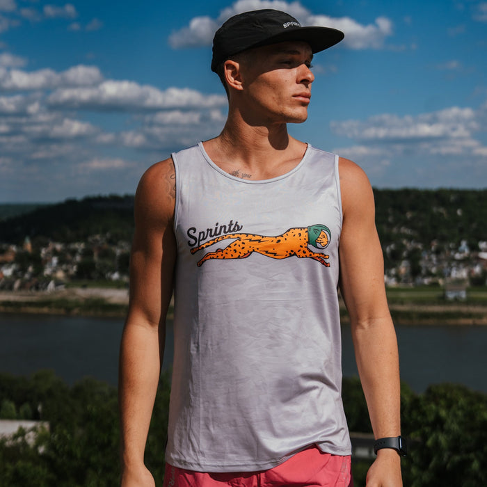 Man wearing the Mens Running Tank in Victory Sprints print
